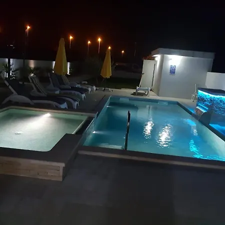 Beautiful With A Comfortable And Cozy Pool And Garden Medulin